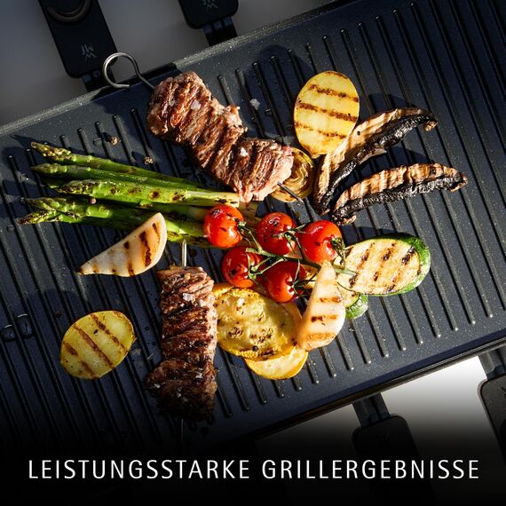 WMF Lono Selection Raclette Grill 8 Personen – Hochwertiger Cromargan Edelstahl, 1500W Leistung, keramikbeschichtete Grillplatte, 8 Pfännchen und Spatel, Temperaturregelung und Ablage