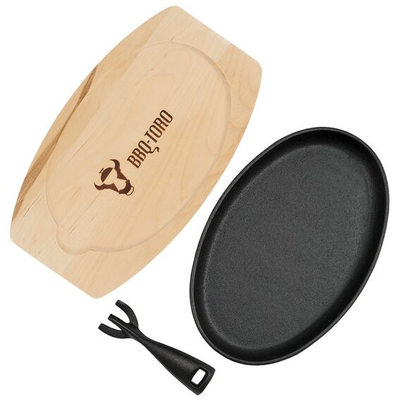 BBQ-Toro Gusseisen Servierpfännchen mit Holzunterlage (1 Stück) | 27 x 18 x 3 cm - oval | Grillpfännchen mit abnehmbarem Griff | Gusseisenpfanne, Paella Pfanne, Gusseisenpfännchen, Gusspfanne