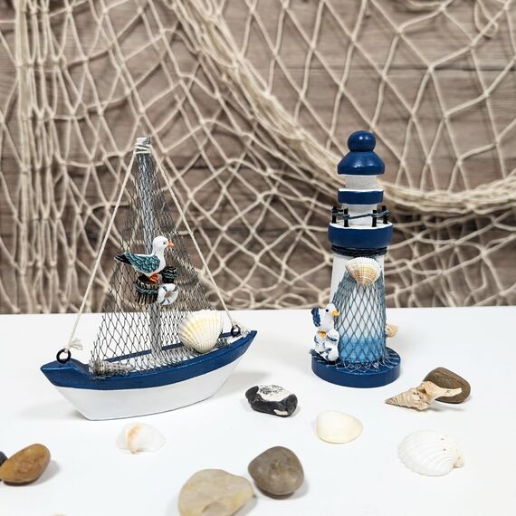 com-four® 2-teiliges maritimes Deko-Set - Segelschiff und Leuchtturm aus Holz im Used-Look (2 Stück Leuchtturm/Segelboot - blau/weiß)