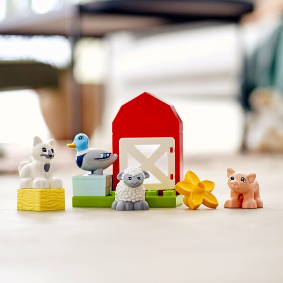 LEGO 10949 DUPLO Tierpflege auf dem Bauernhof Spielzeug für Kleinkinder ab 2 Jahren mit Figuren: Ente, Schwein, Schaf und Katze