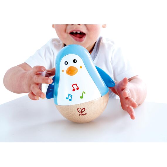 Hape Stehauf-Pinguin - Babyspielzeug aus Holz mit klingelnder Glocke, blau, Motorik- und Gleichgewichtsförderung, sensorisches Lernspielzeug für Babys ab 6 Monaten