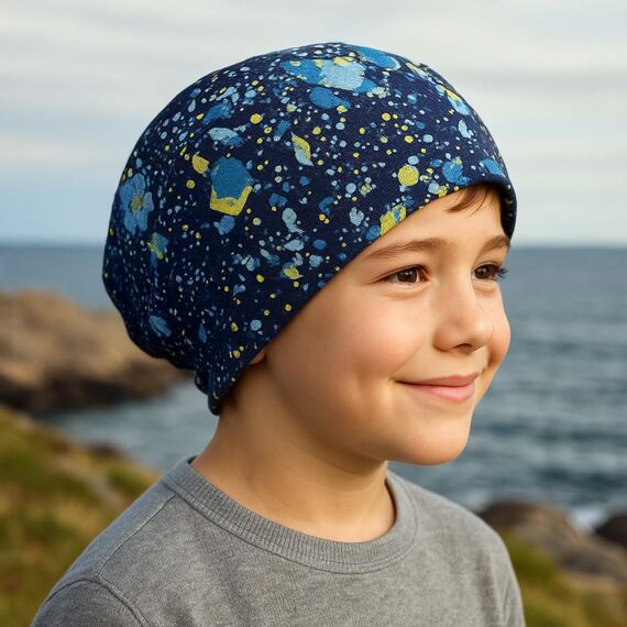 Wollhuhn Kinder Beanie – Zweilagige Longbeanie aus Jersey, wendbar & weich – innen grau – Handmade in Deutschland – ganzjährig (DE/NL/SE/PL, Numerisch, 56, 58, Splatter Dunkelblau/Bunt)