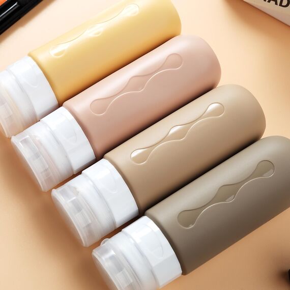 Gemice Silikon Reiseflaschen 90ml Set, 4 Stück auslaufsichere Reise Container und Reise Toilettenartikel Set, FDA zugelassene nachfüllbare Flüssigkeitsbehälter für Shampoo Creme Spülung Körperpflege