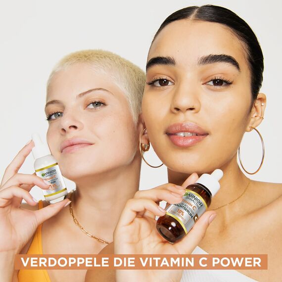 Garnier Vitamin C Glow Booster Serum Duo für Tag & Nacht, Mit Anti-Dark Spot Serum und Brightening Night Serum gegen dunkle Flecken und müde Haut, Vegane Formel, SkinActive, 2 x 30 ml