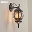 HOFSTEIN Außenwandleuchte Lentua, Außenwandlampe aus Metall/Kunststoff in Schwarz/Klar, Wandleuchte Down im Retro/Vintage/Antik-Design, E27, IP44, Eingangsbereich, Terrasse, Haustür, Hof
