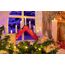 Idena 31604 - LED Adventsleuchter mit 7 LED Kerzenlichtern in Warmweiß, Schwibbogen aus rot lackiertem Holz, mit Ersatzlampe und Schalter, Deko für Innen, als Winter-, Advents- und Weihnachtsdeko
