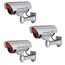 BASI | 3er Set Kamera-Attrappe mit blinkendem LED-Licht | Dummy Kamera | Sicherheitskamera | Überwachungskamera für den Innen- und Außenbereich | Wandhalterung | drahtlos, Silber | CCTV | 3 Stück