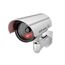 BASI | 2er Set Kamera-Attrappe mit blinkendem LED-Licht | Dummy Kamera | Sicherheitskamera | Überwachungskamera für den Innen- und Außenbereich | Wandhalterung | drahtlos, Silber | CCTV | 2 Stück