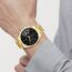 Tommy Hilfiger Multi Zifferblatt Quarz Uhr für Herren mit Goldfarben Edelstahlarmband - 1710447