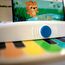 Baby Einstein, Hape, Holzspielzeug Magic Touch Piano , Musikspielzeug Klavier aus Holz für Kinder, Musikinstrumente mit 3 Notenblättern und 6 Liedern, Aktivität und Sensorisches Spielzeug, 6 Monaten+