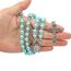 Nazareth Store Hellblaue Perlen Perlen Rosenkranz Katholische Halskette mit Wundermittel Medaille Kreuz Kruzifix Silberfarbene Rosenkränze in Samttasche