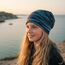 Wollhuhn Kinder Beanie – Zweilagige Longbeanie aus Jersey, wendbar & weich – mit Grauer Innenseite – Handmade in Deutschland – ganzjährig tragbar (Lines Türkis/Schwarz, L)